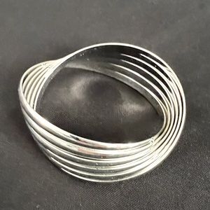 Silver-toned metal super unique and stylish bracelet.